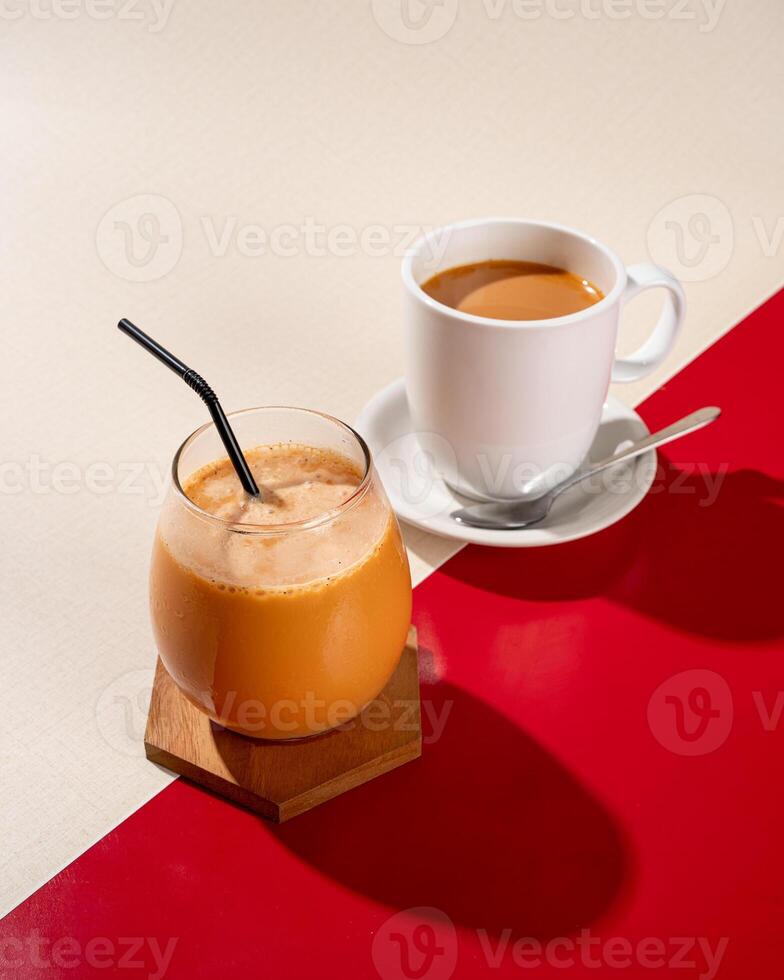 Teh Tarik is a sweet drink in the form of a mixture of tea and milk which is commonly found in Southeast Asia, especially Indonesia, Malaysia and Singapore photo