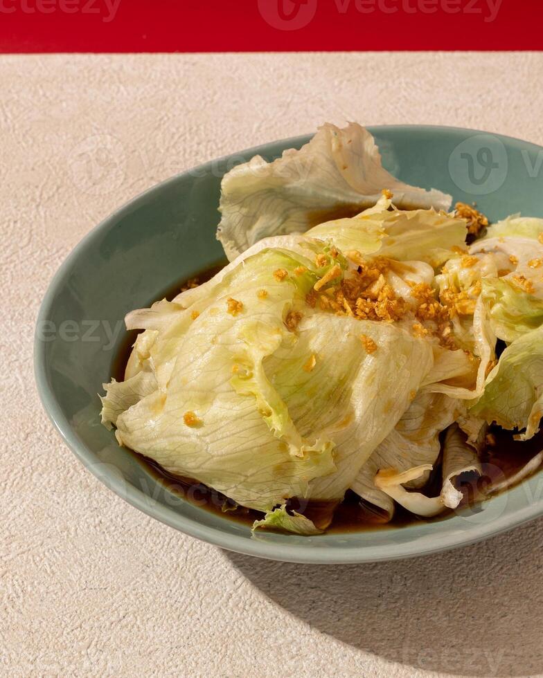 This lettuce has a fresh and soft taste sauteed with garlic photo