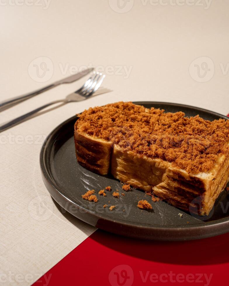 Roti Bakar is a typical grilled Indonesian sandwich, consisting of two slices of bread and a filling of shredded beef photo
