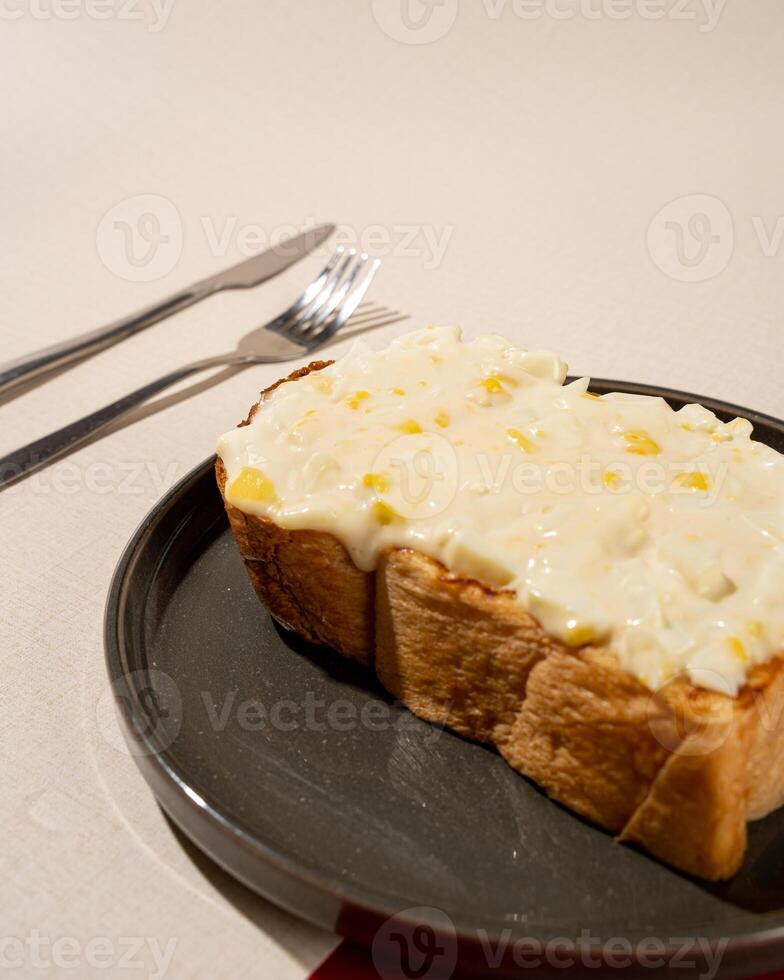 Roti burn is a typical grilled Indonesian sandwich, consisting of two slices of bread and stuffed with egg and mayo photo
