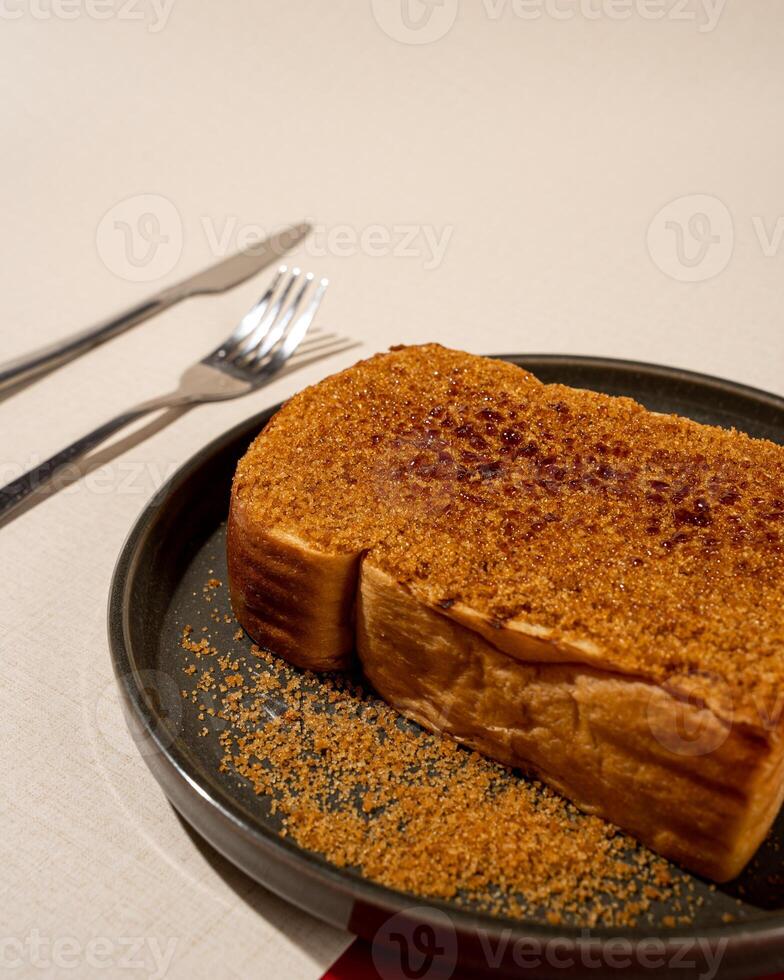 Roti Bakar is a typical grilled Indonesian sandwich, consisting of two slices of bread and palm sugar filling photo