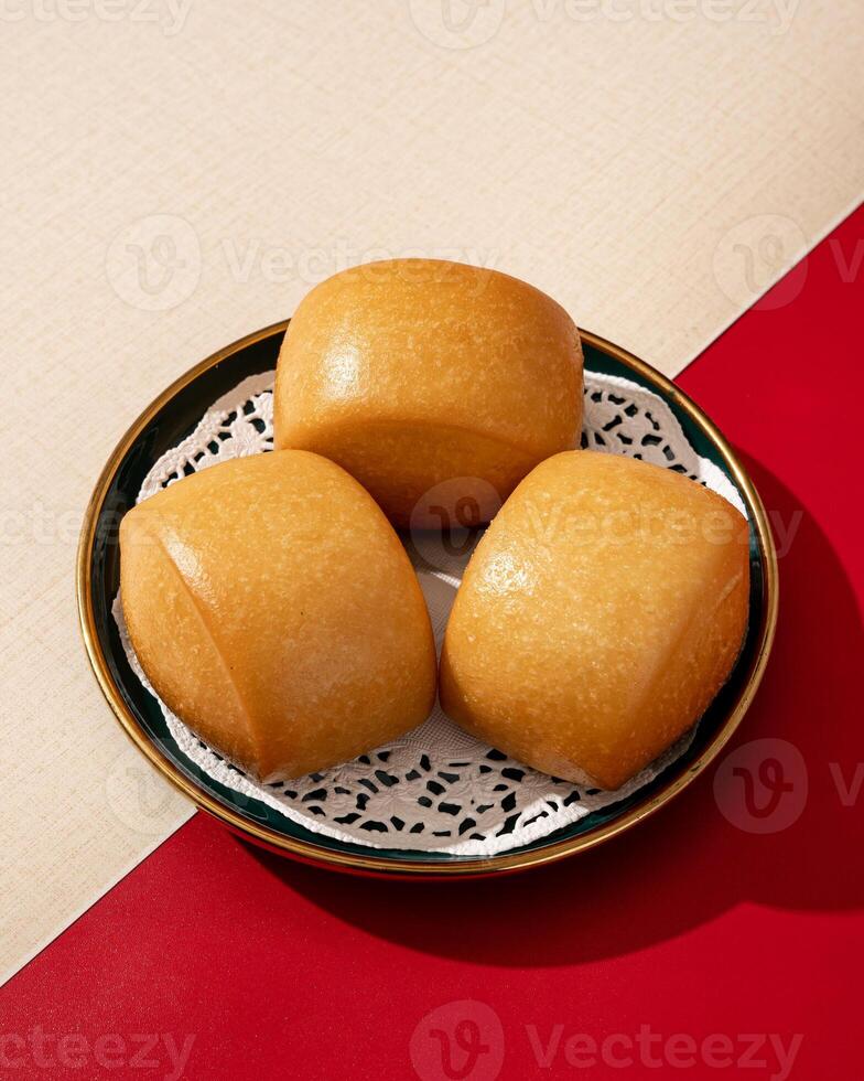 Mantau is a Chinese food that resembles buns, this mantau has no filling and is just pure bread made from wheat flour. photo
