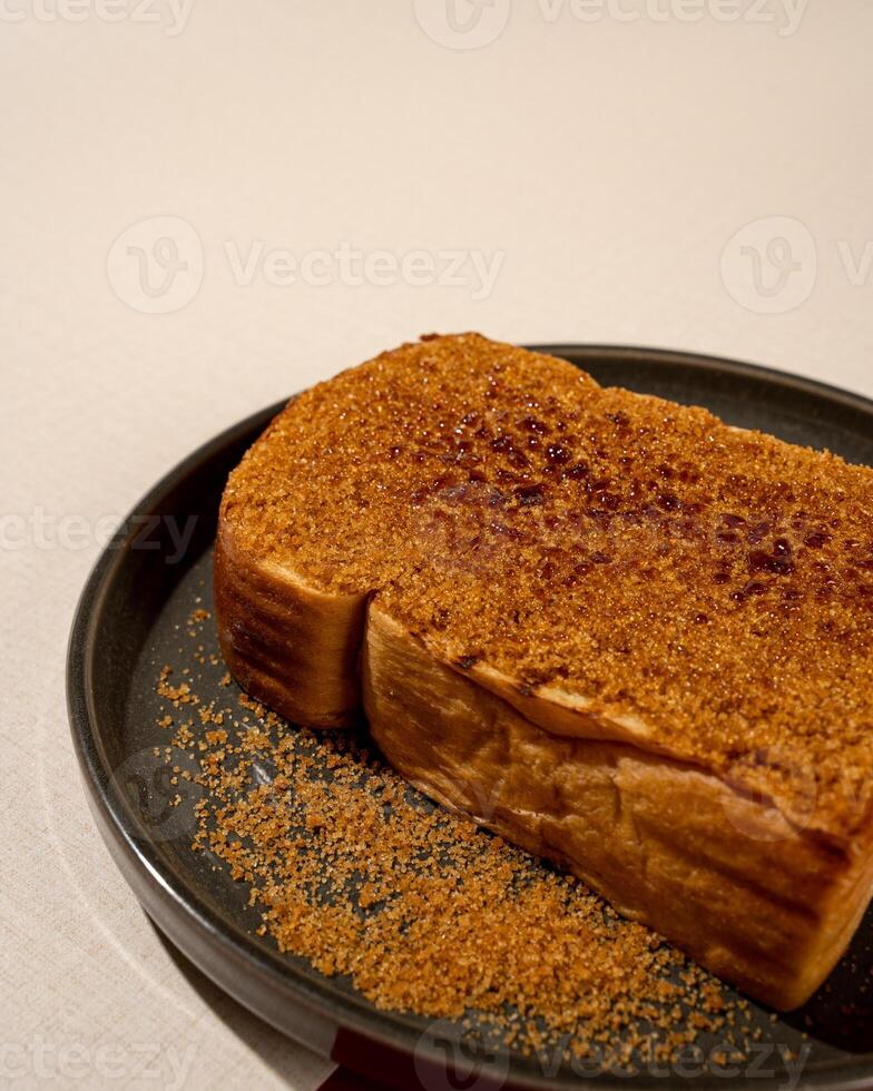 Roti Bakar is a typical grilled Indonesian sandwich, consisting of two slices of bread and palm sugar filling photo