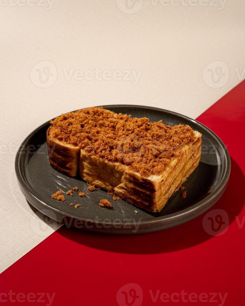 Roti Bakar is a typical grilled Indonesian sandwich, consisting of two slices of bread and a filling of shredded beef photo