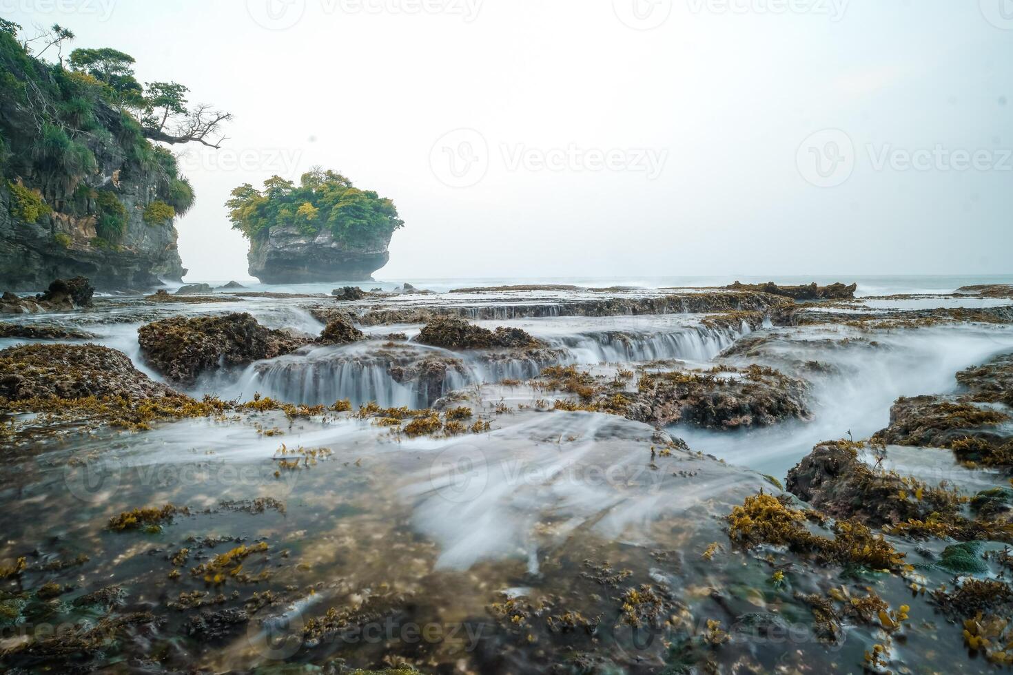 seascape is very beautiful with coral rocks and sea water that looks very soft like cotton. slow shutter speed effect photo