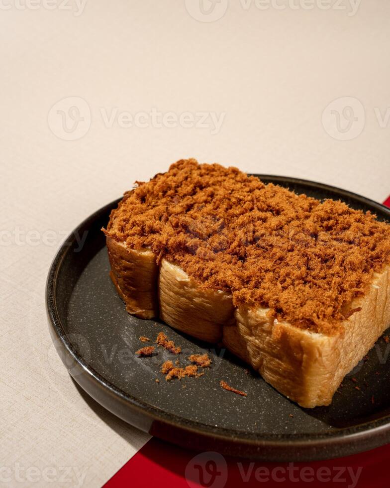 Steamed bread is a type of bread, usually made from wheat, that is prepared by steaming, rather than baking, with a filling of shredded beef. photo