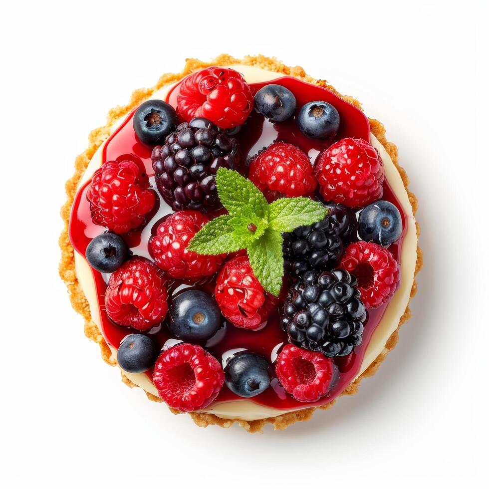 Delicious fruit tart topped with fresh berries and a mint leaf, isolated on a white background. Perfect for dessert or baking imagery. photo
