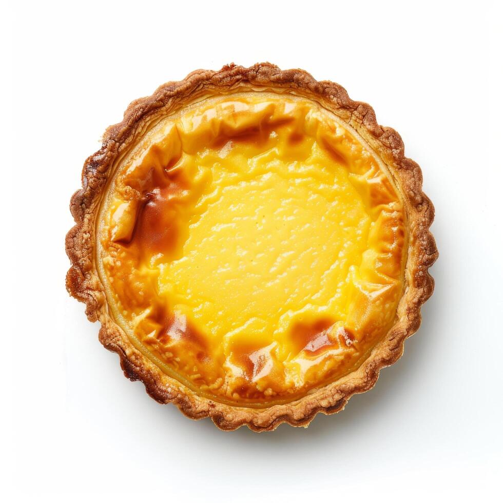 Delicious golden custard tart with a crispy crust, perfect dessert or snack option for pastry lovers captured on a white background. photo