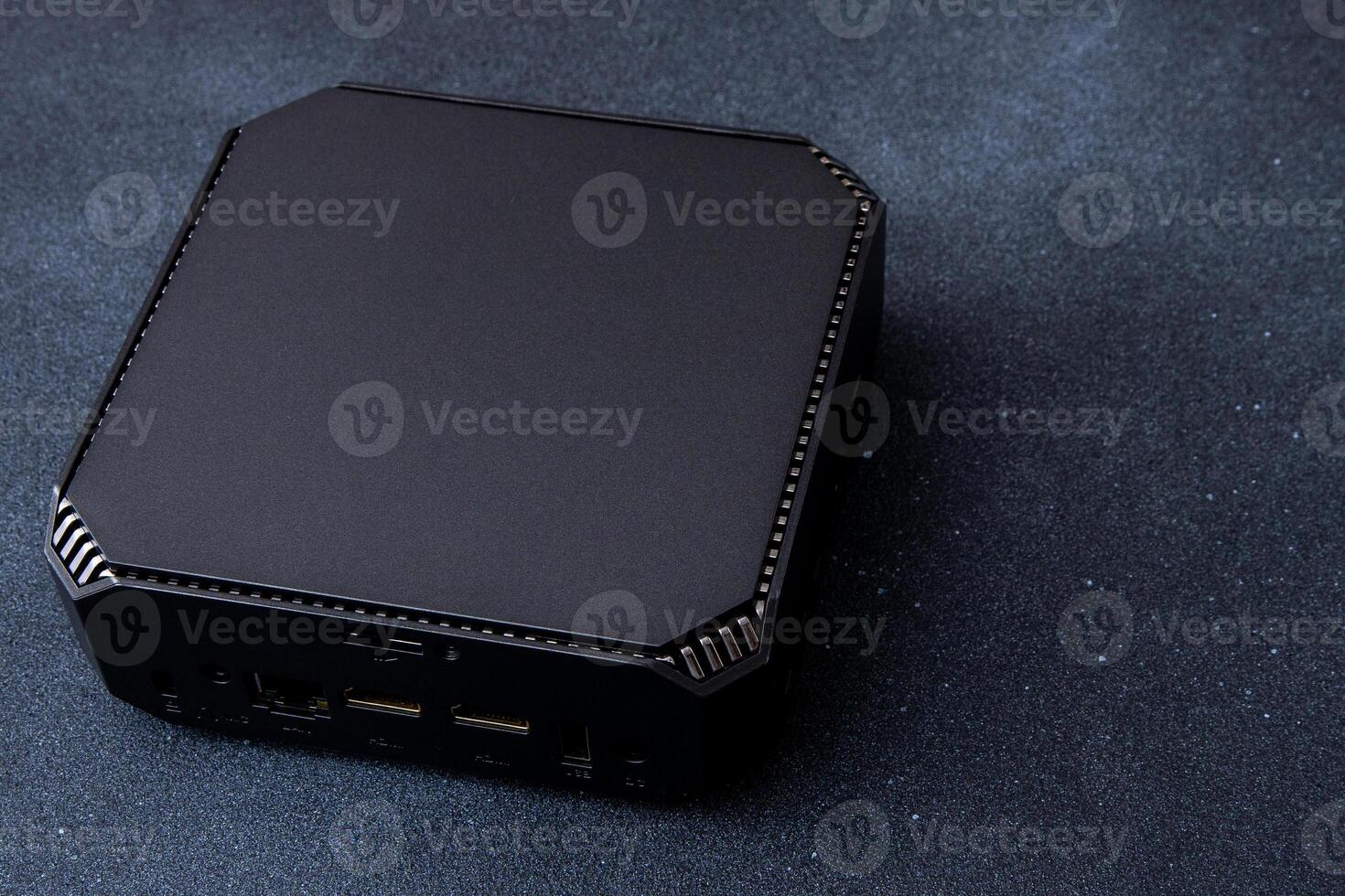 A small system unit of a personal computer. Compact device. photo