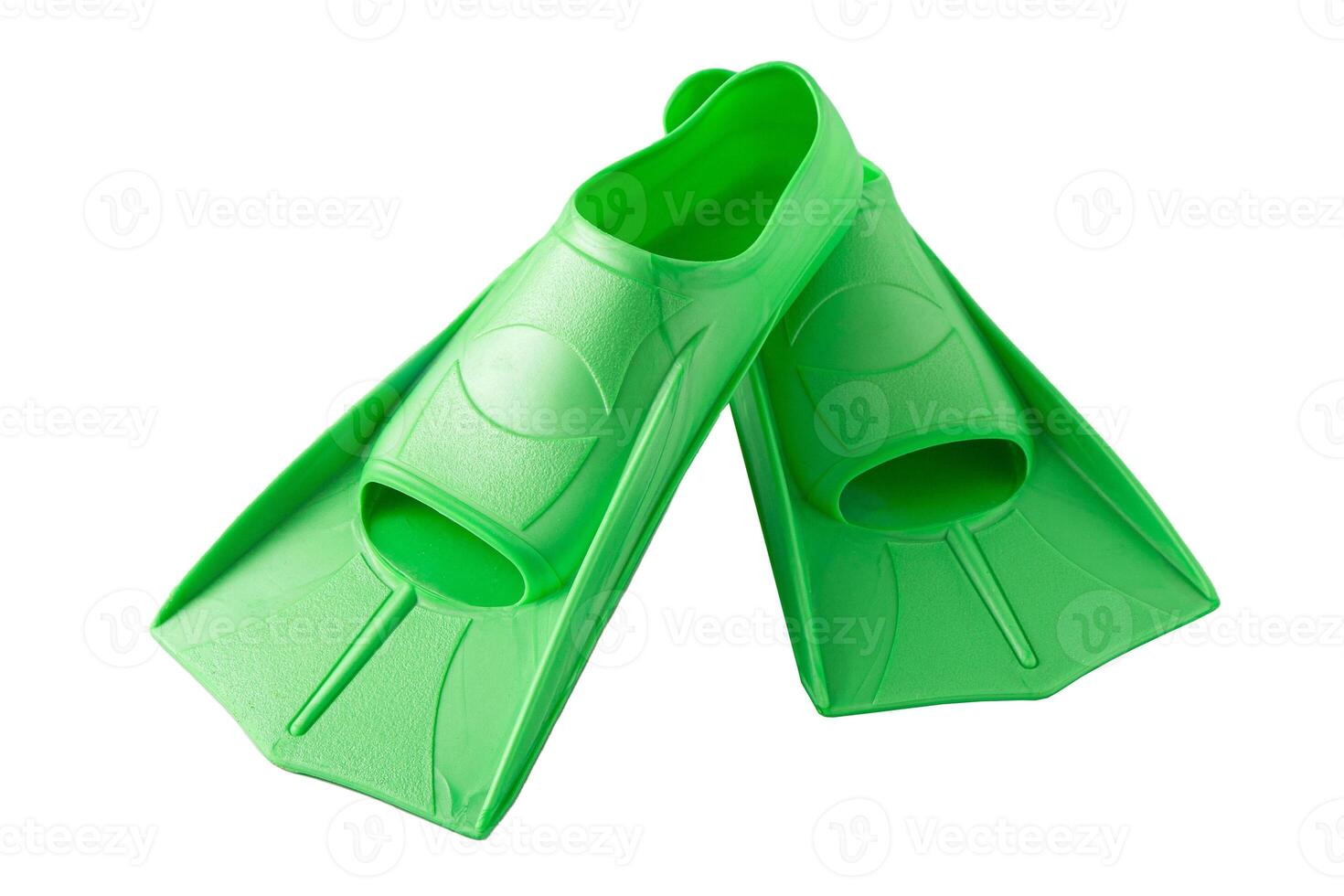 Green flippers for summer swimming in the sea and in the pool. Sports equipment isolated. photo