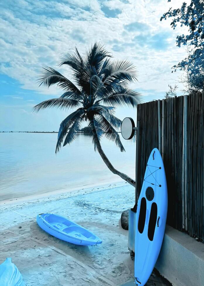 Beautiful light blue tone beach scenery. photo