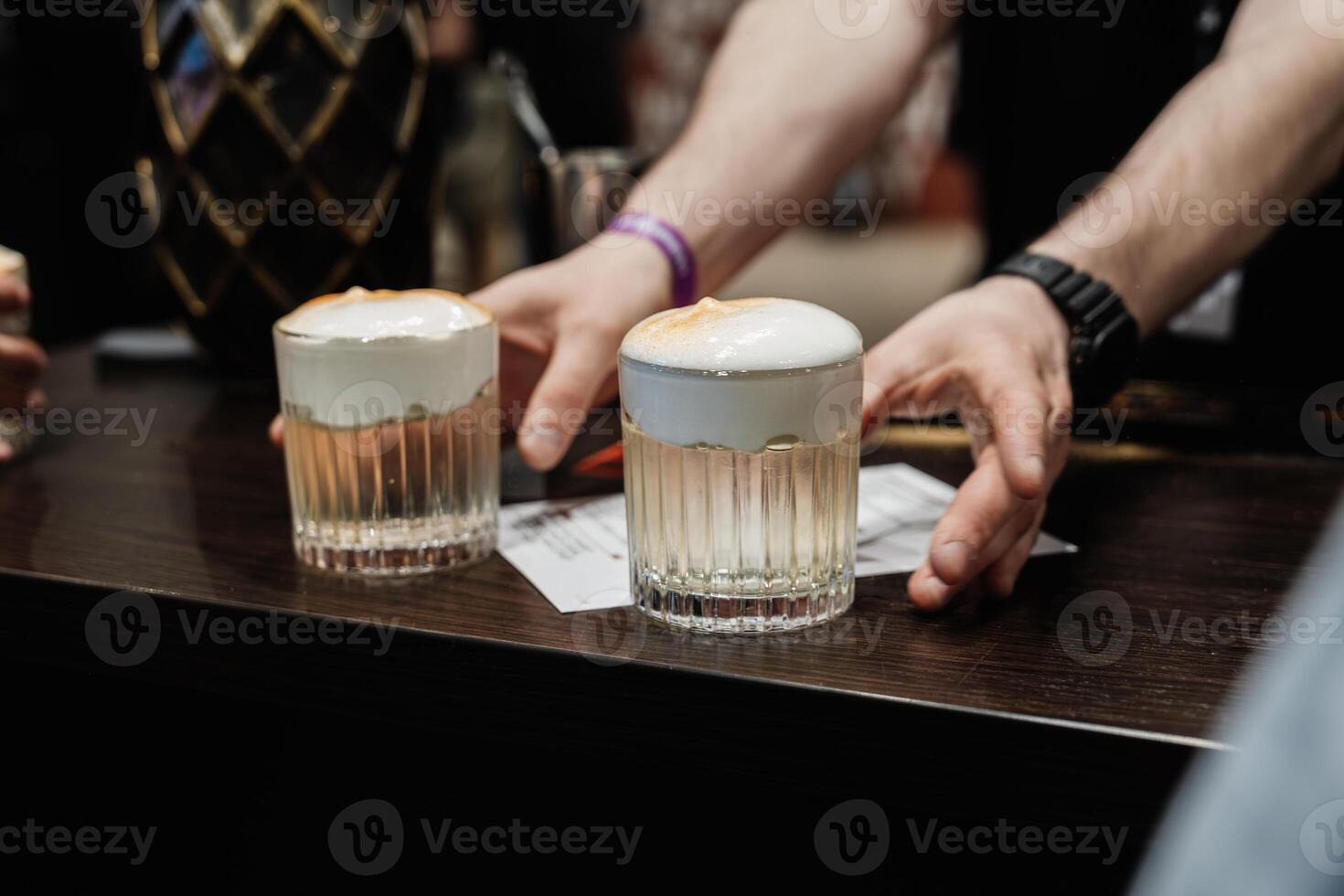 Preparation of a delicious cocktail based on juice and fruit. photo