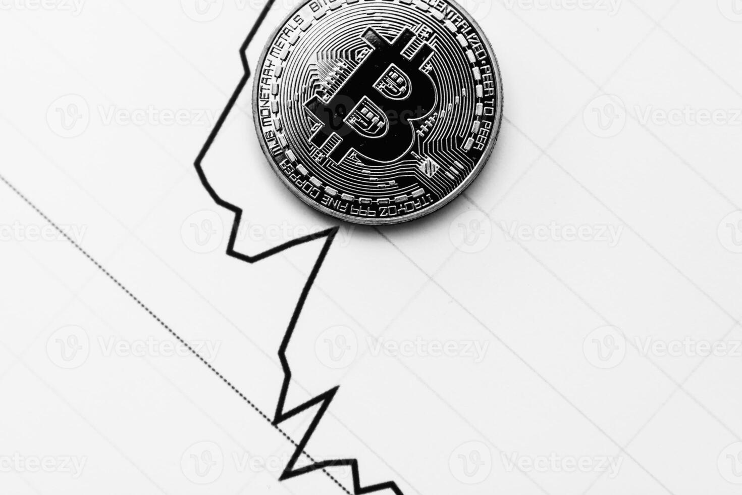 Bitcoin on a black and white background. Cryptocurrency trading. photo