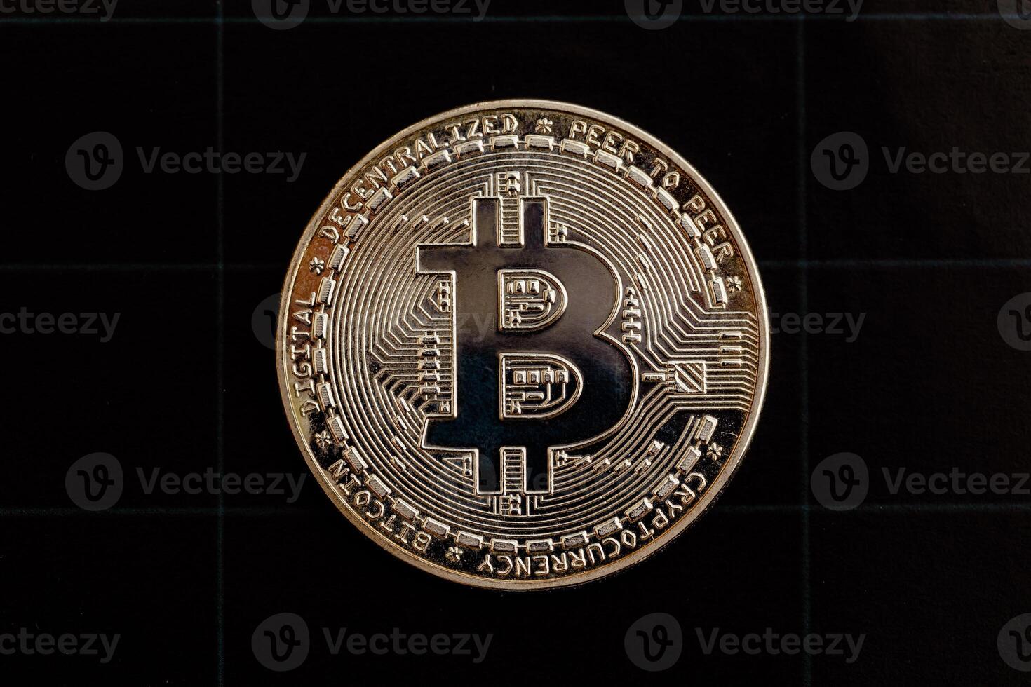 Bitcoin on a black background. photo