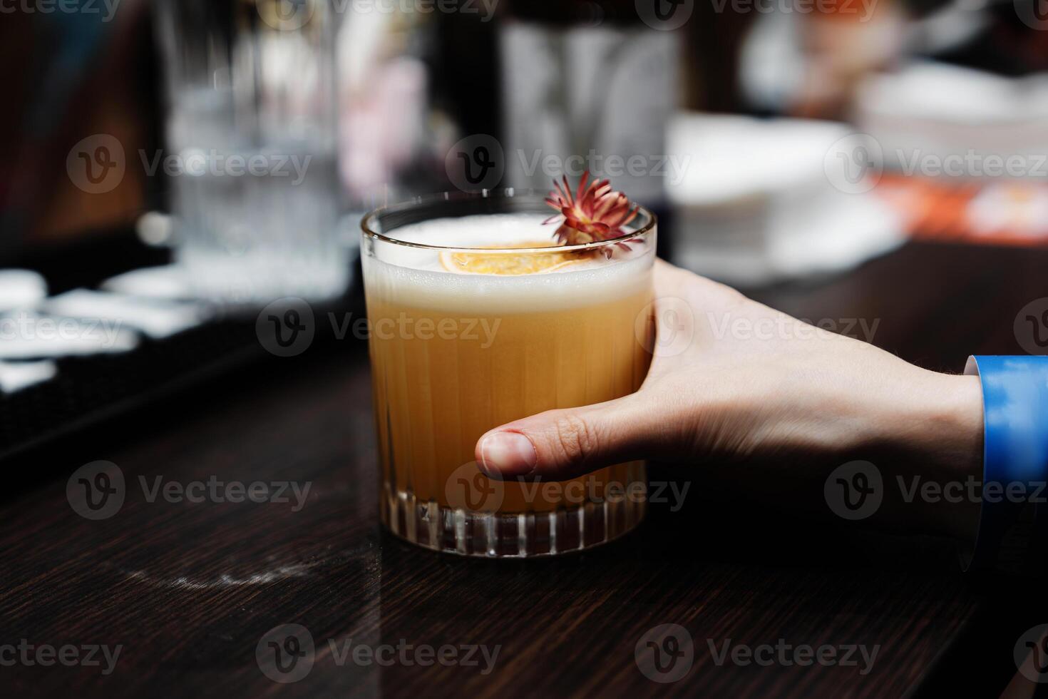 Preparation of a delicious cocktail based on juice and fruit. photo