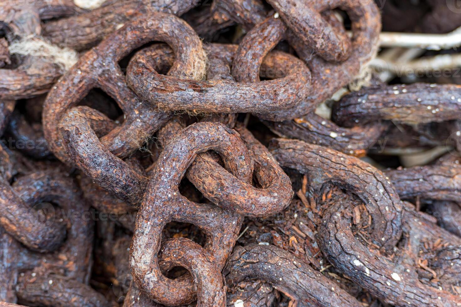 Old rusty chain in Mevagissey Cornwall photo