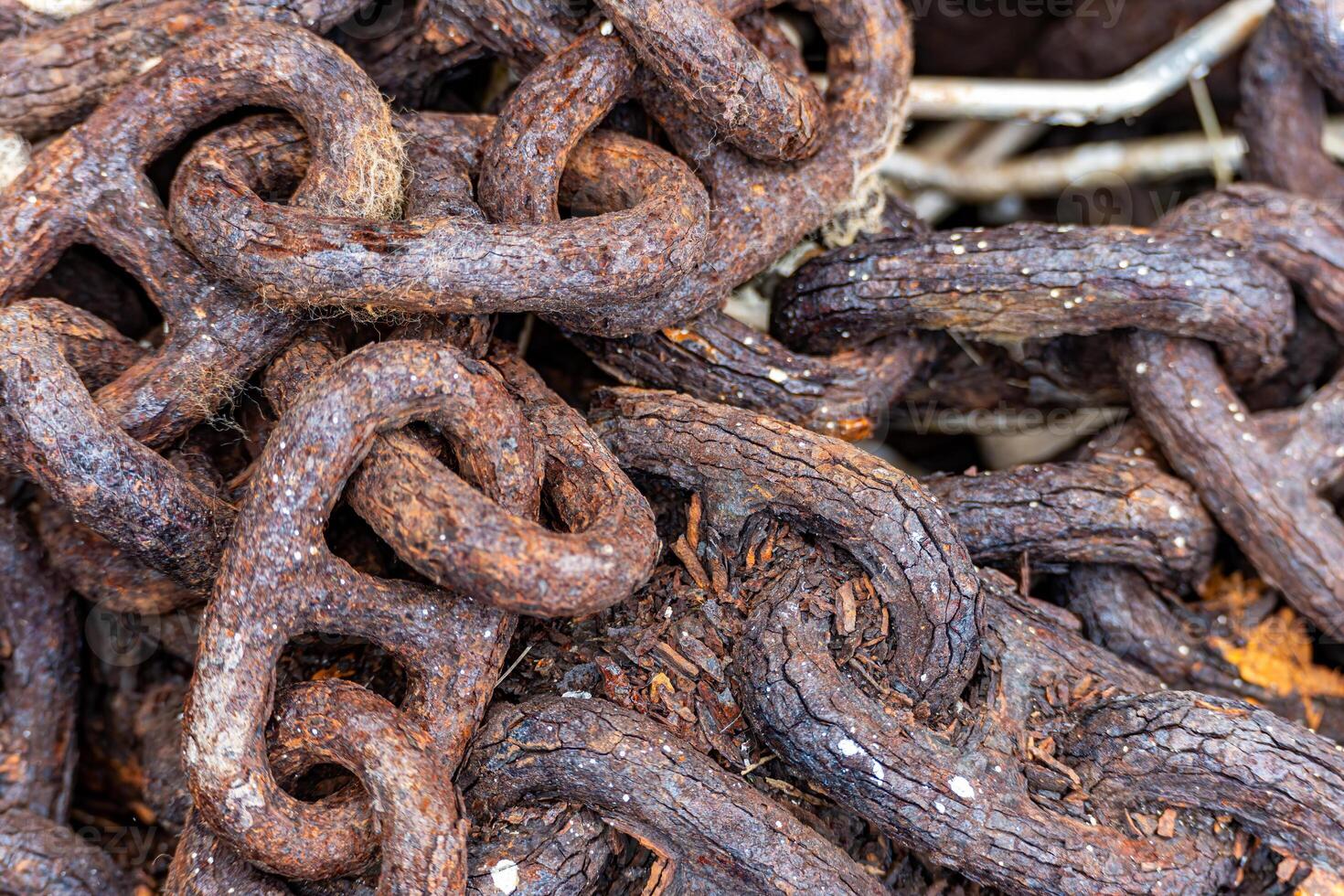 Old rusty chain in Mevagissey Cornwall photo