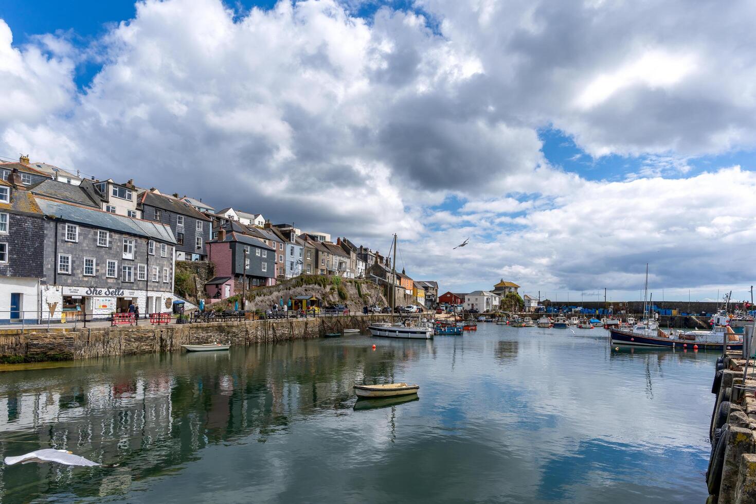 MEVAGISSEY, CORNWALL, UK, MAY 3. View of Mevagissey harbour in Cornwall on May 3, 2024. Unidentified people photo