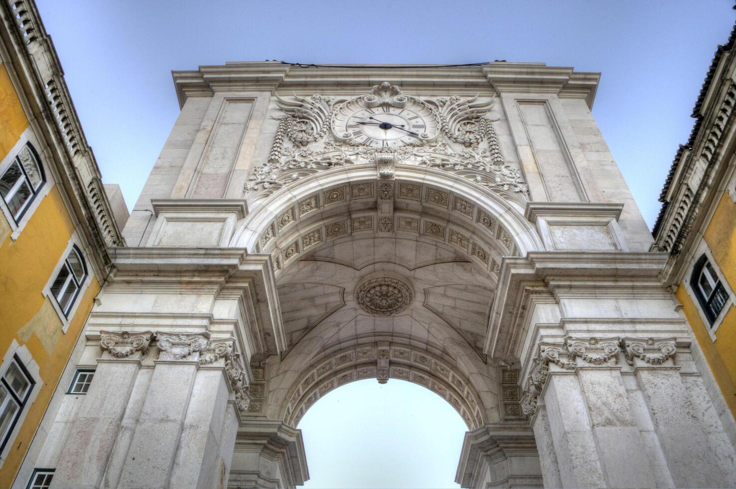 Lisbon, Portugal. July 15, 2014. The Arco da Rua Augusta in Lisbon, an iconic triumphal arch at the end of a vibrant pedestrian street. photo