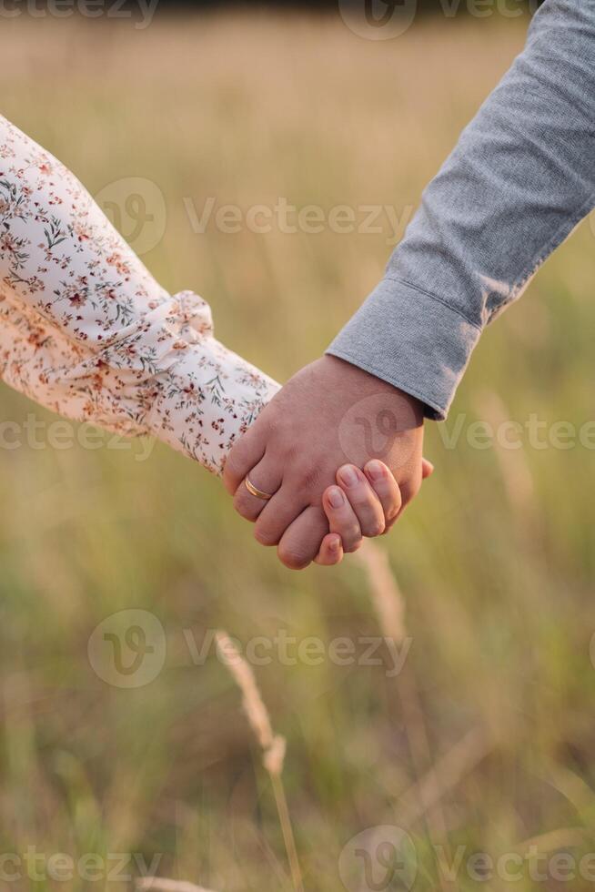 the hands of a young couple photo