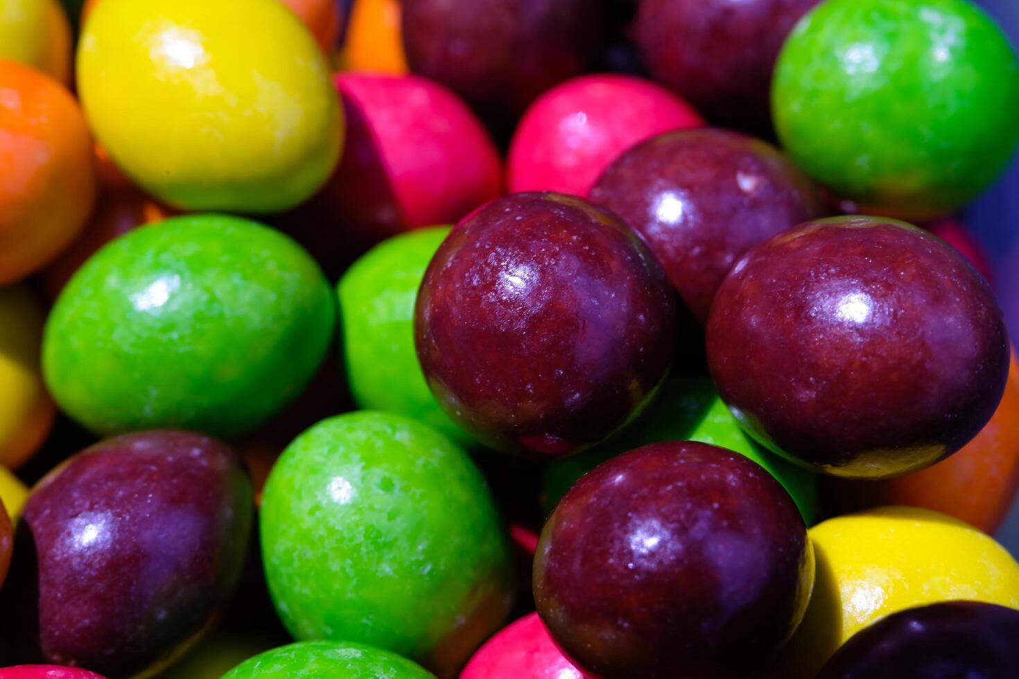 Photography of nuts covered in colorful chocolate and sugar. Textured Detail of Gourmet Background. Graphic Resources. Food Photography. Cookies and pastries. Food Photography Concept. Backgrounds photo