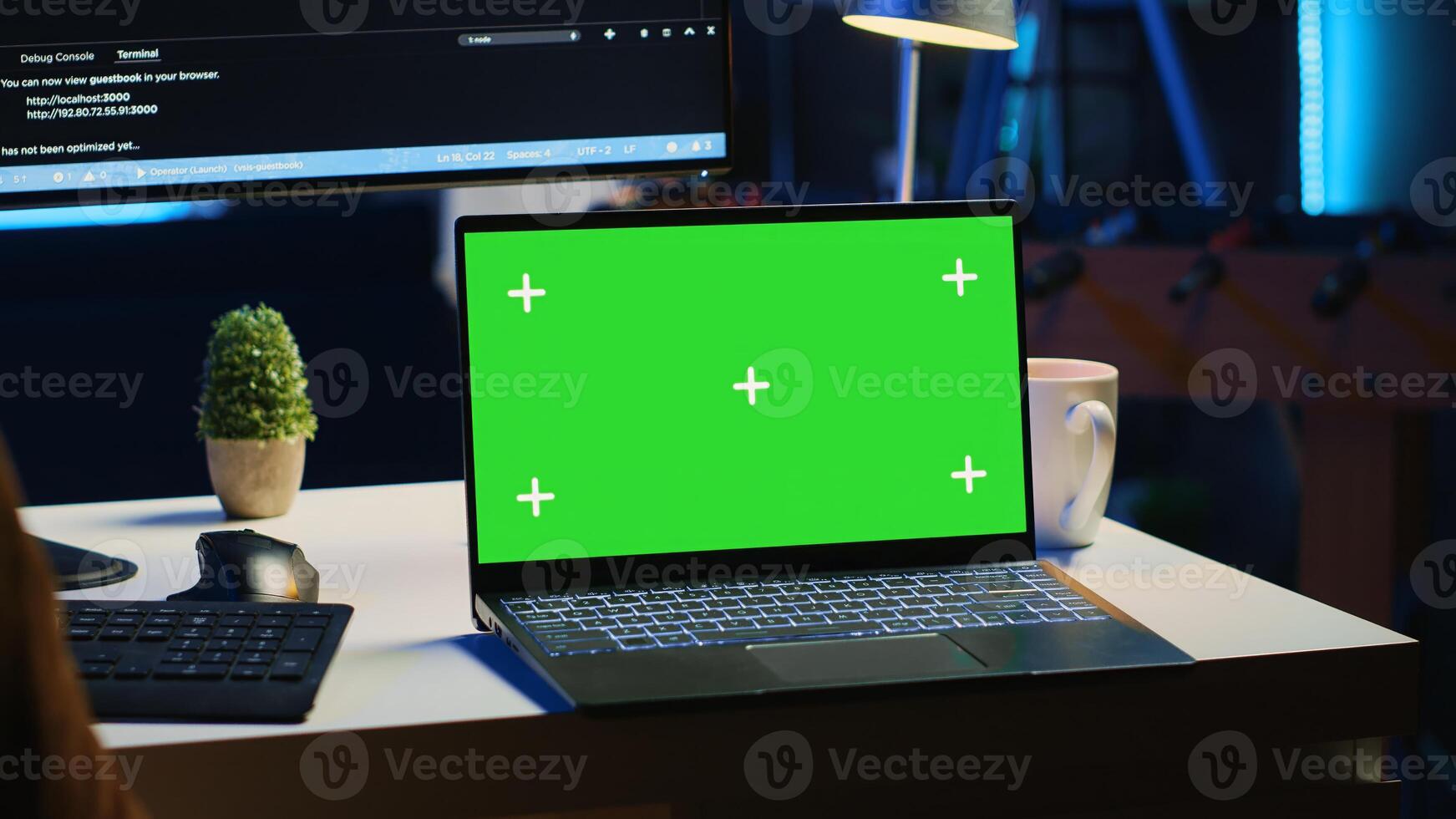 Green screen laptop in home office used for developing software applications. Mockup notebook used by teleworking IT specialist for programming, camera A close up panning shot photo