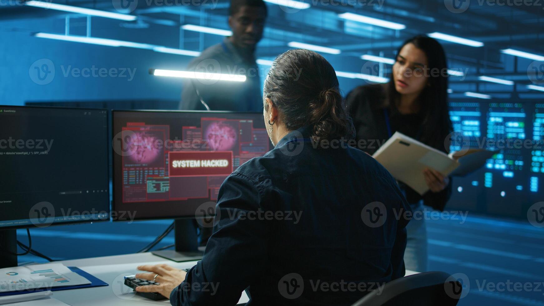 Admin in server hub panicked by valuable data threatened by hacking attack on computers. Scared coworkers failing to safeguarding data center against unauthorized access and vulnerabilities photo