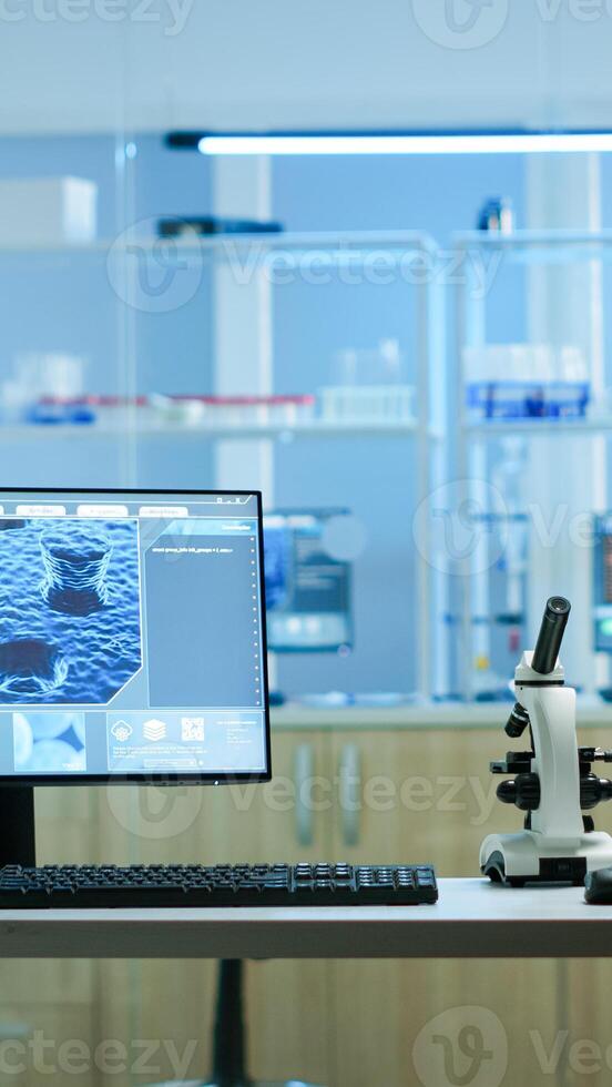 Chemist laboratory with nobody in it modernly equipped prepared for pharmaceutical innovation using high tech and microbiology tools for scientific research. Vaccine development against covid19 virus photo
