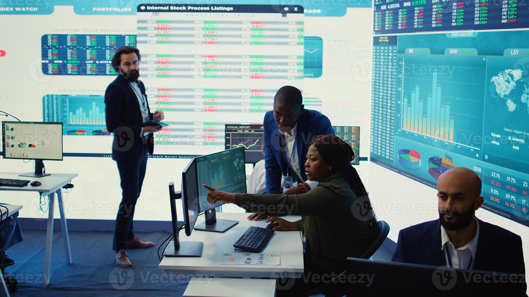 Business associates evaluating key performance indicators within the company, conducting evaluations and discussing workflow situation. Workers enhancing productivity and efficiency. Camera B. photo