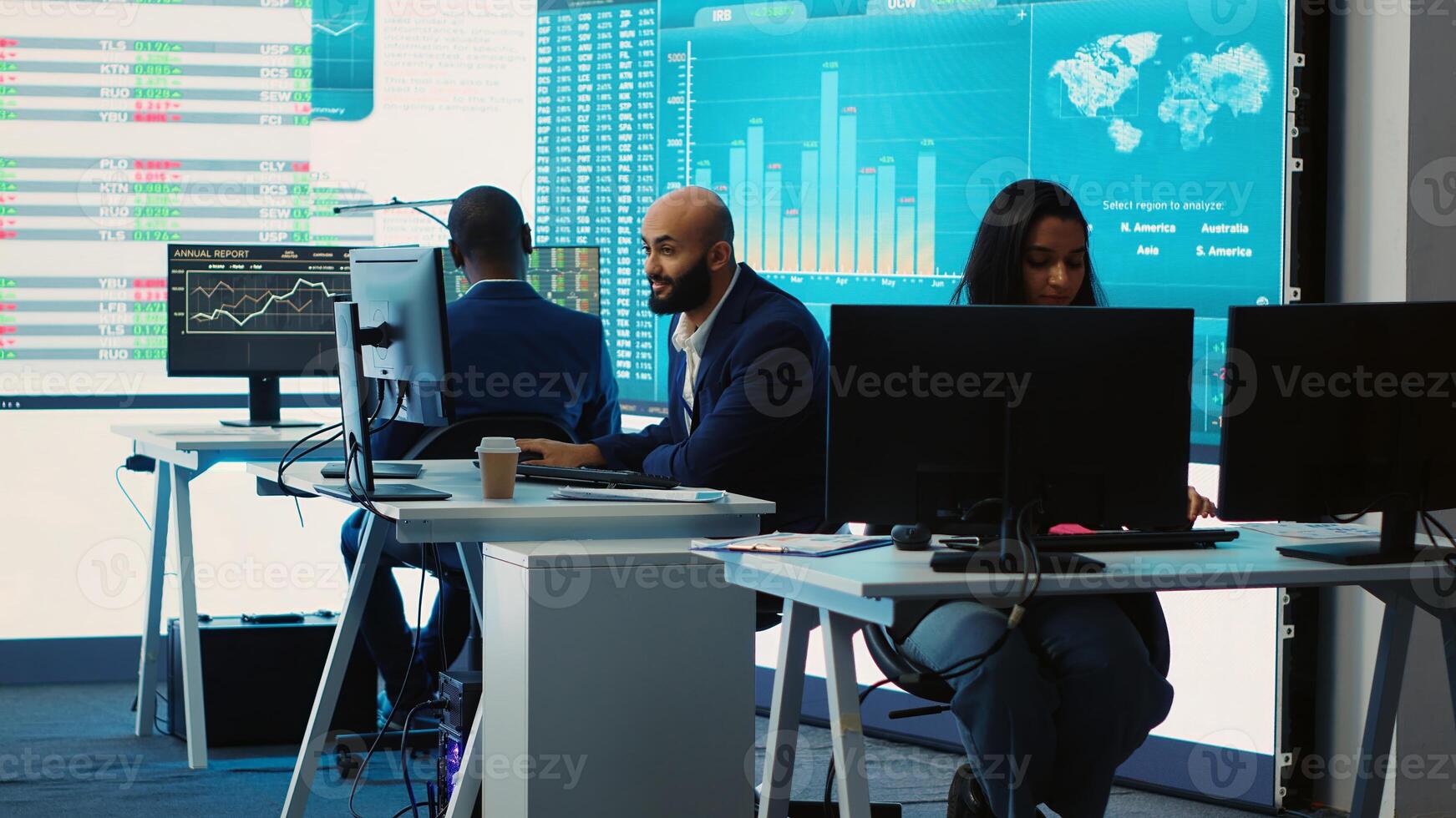 Forecast affiliates working in coworking space office to review latest business news based on performance metrics and progress. Consultants fight to expand the enterprise globally. Camera A. photo