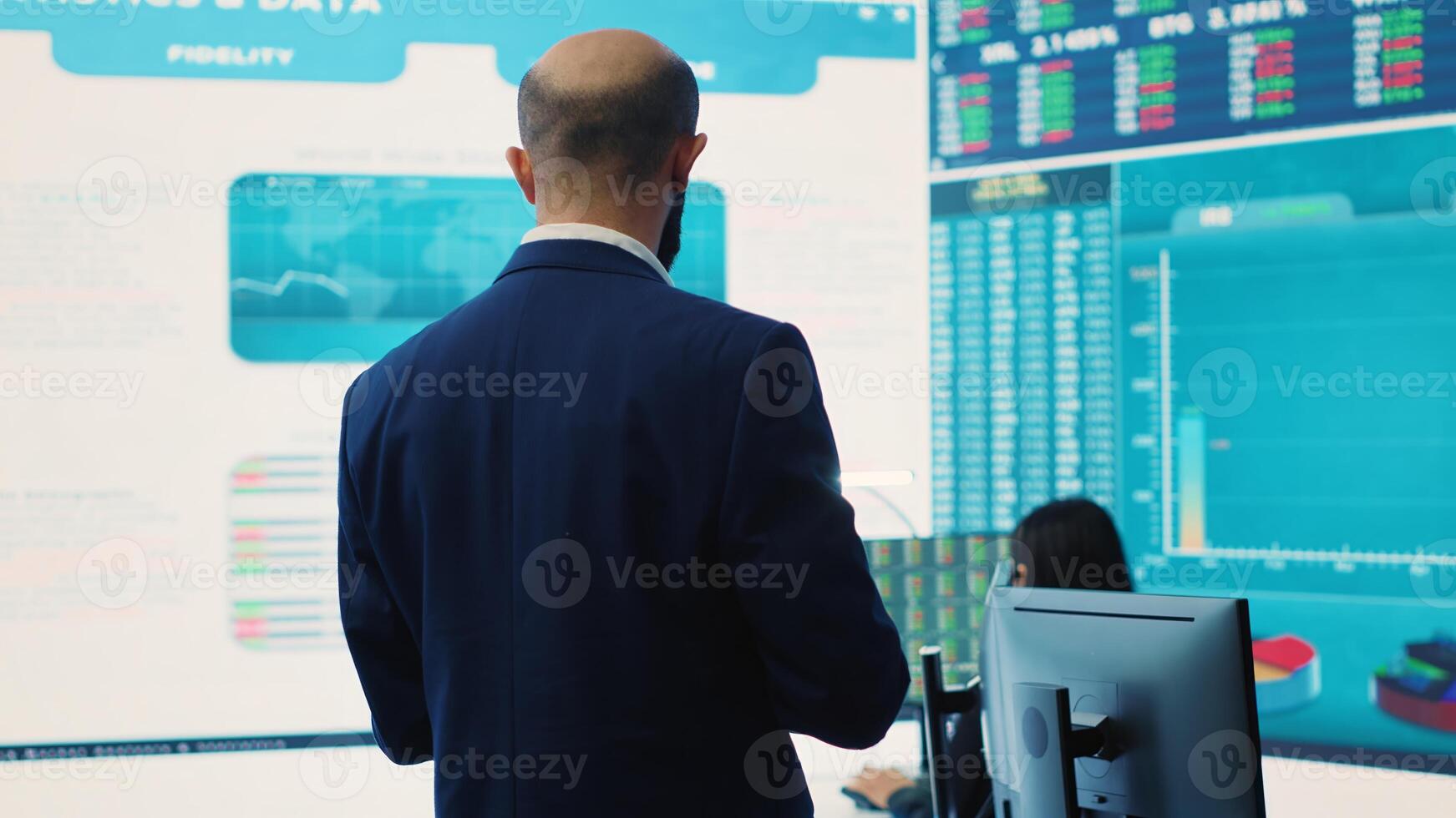 General director employing big data to help in solving tasks in control room, operating on huge screen to create a performance metrics analysis. Manager ensuring organizational efficiency. Camera A. photo