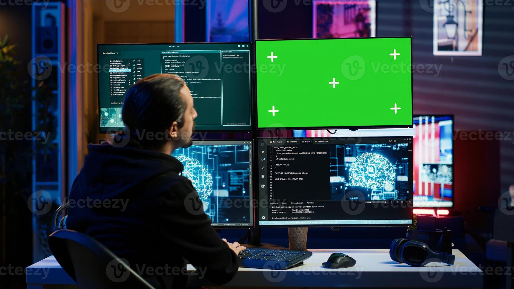 Hacker using green screen monitor and artificial intelligence to write spyware software gathering data from users. Scammer in apartment using AI and mockup PC display to do fraud using AI, camera A photo