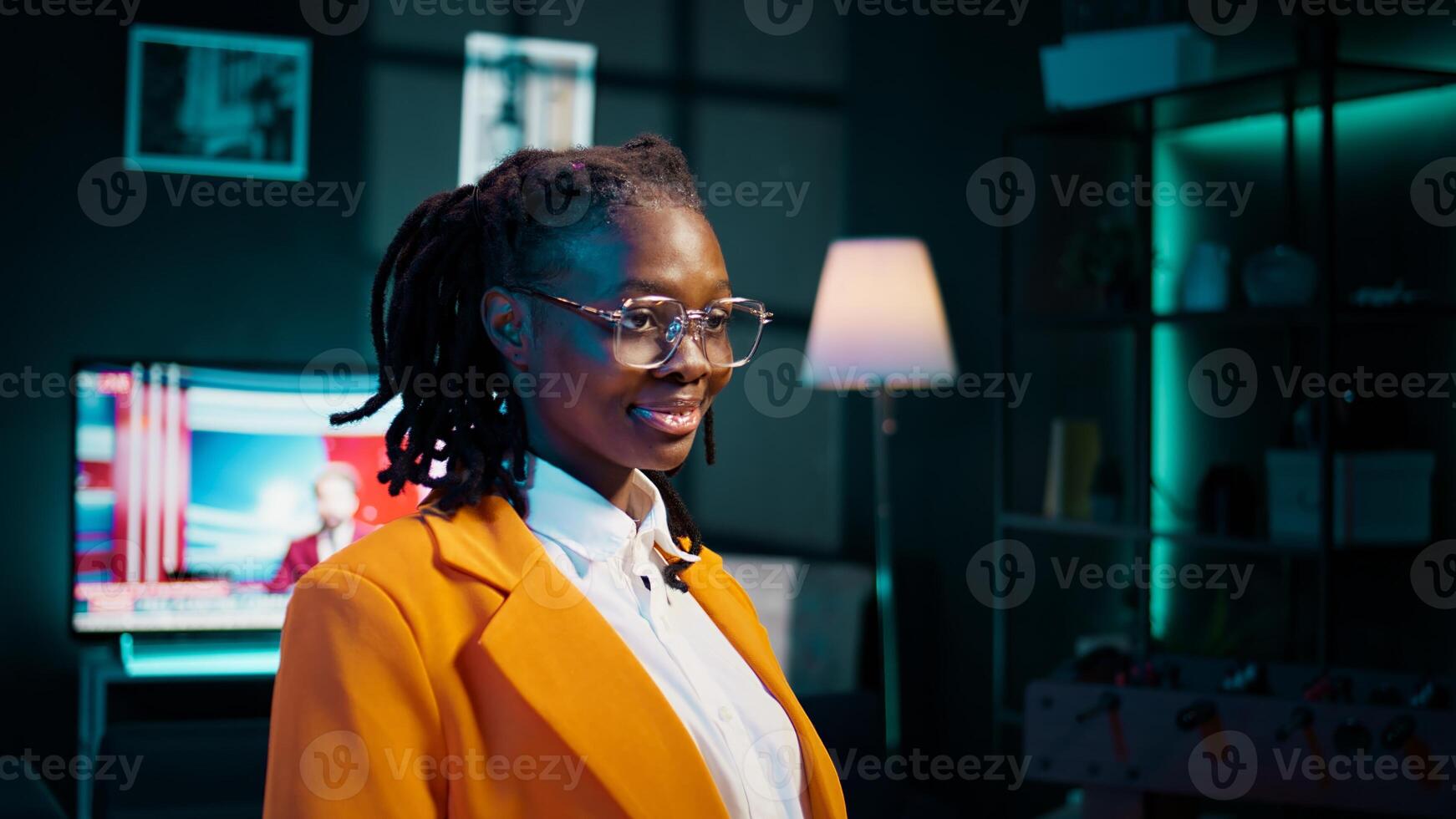 Portrait of african american college student does remote work at home, studying english literature on online classes. Learning languages through academic platforms software or courses. Camera B. photo