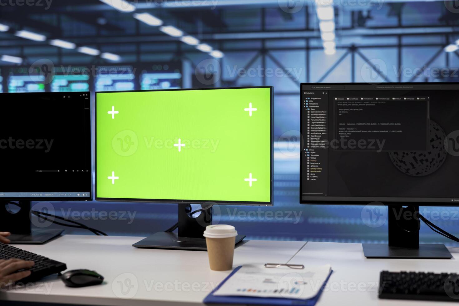 Lines of code running on green screen computers in data center, used for troubleshooting rackmounts in server rows. Close up shot of programming scripts on mockup PC monitors in server room photo