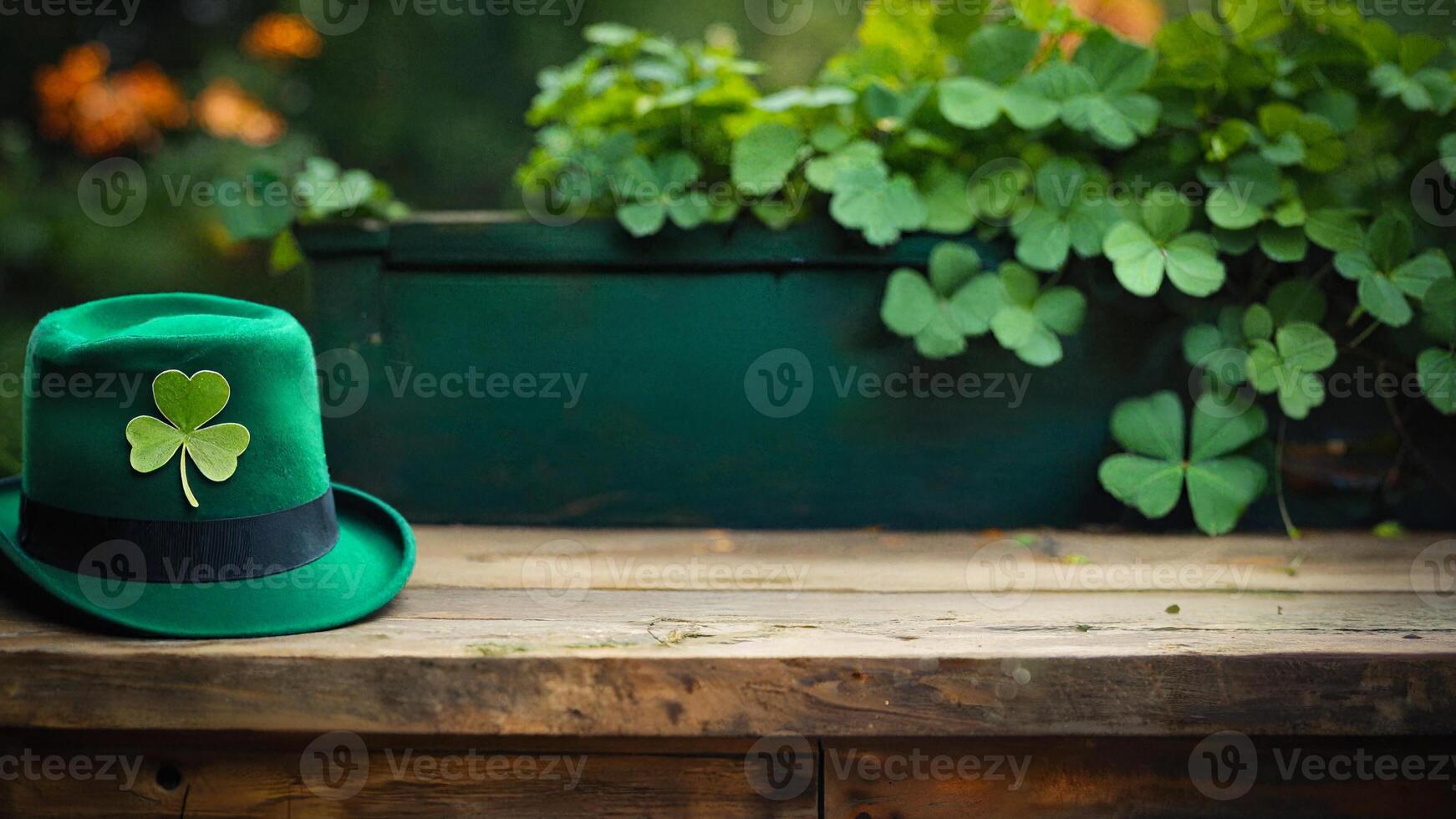 st patrick's day, green hat with shamrock on wooden table on shamrock background with space for text photo