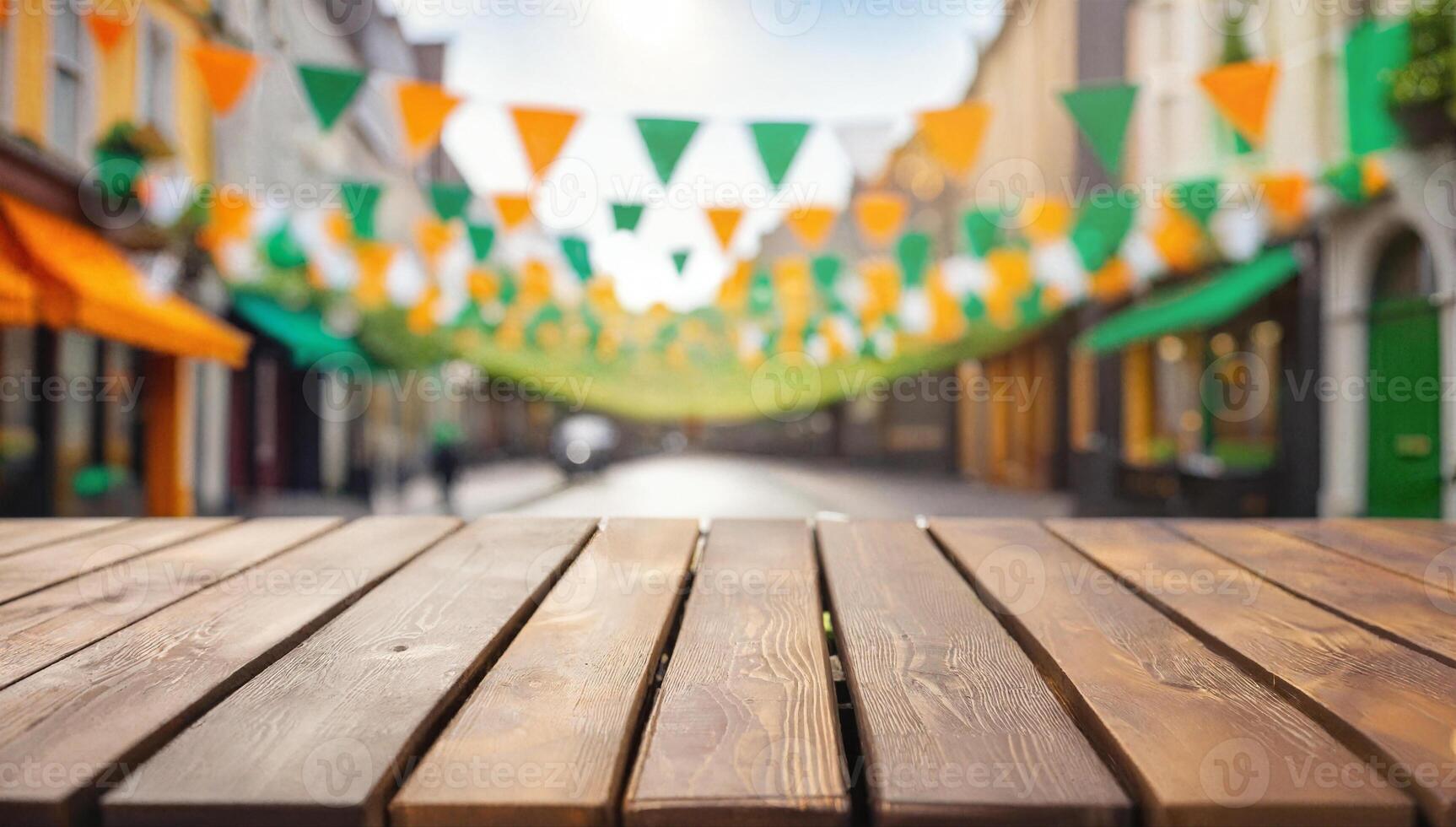 empty wooden table, blurred bokeh background of decorated street with festival flags, st. patrick's day photo