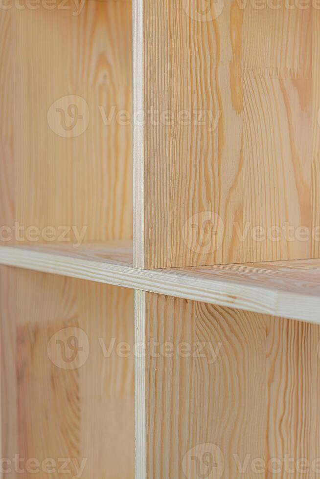 four shelves of the cabinet with a partial focus in the center photo