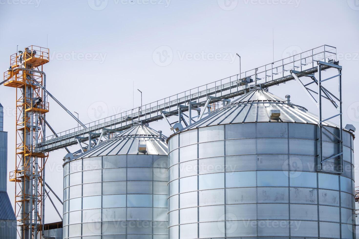 silos granary elevator on agro-industrial complex with seed cleaning and drying line for grain storage photo