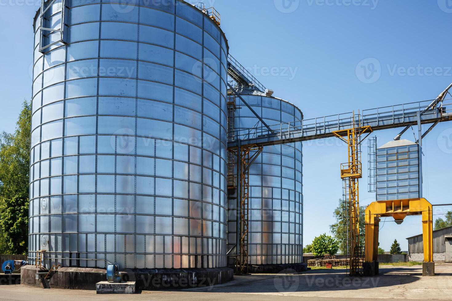 silos granary elevator on agro-industrial complex with seed cleaning and drying line for grain storage photo