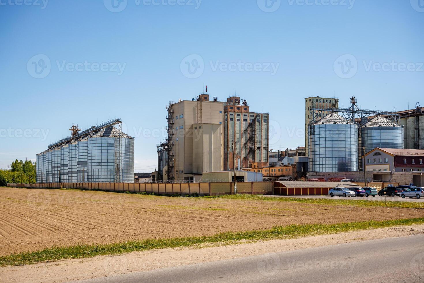 silos granary elevator on agro-industrial complex with seed cleaning and drying line for grain storage photo