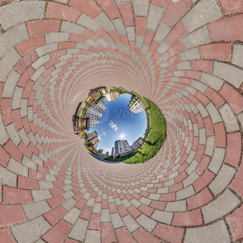 blue hole sphere or globe little planet inside sand or dry grass round frame background photo