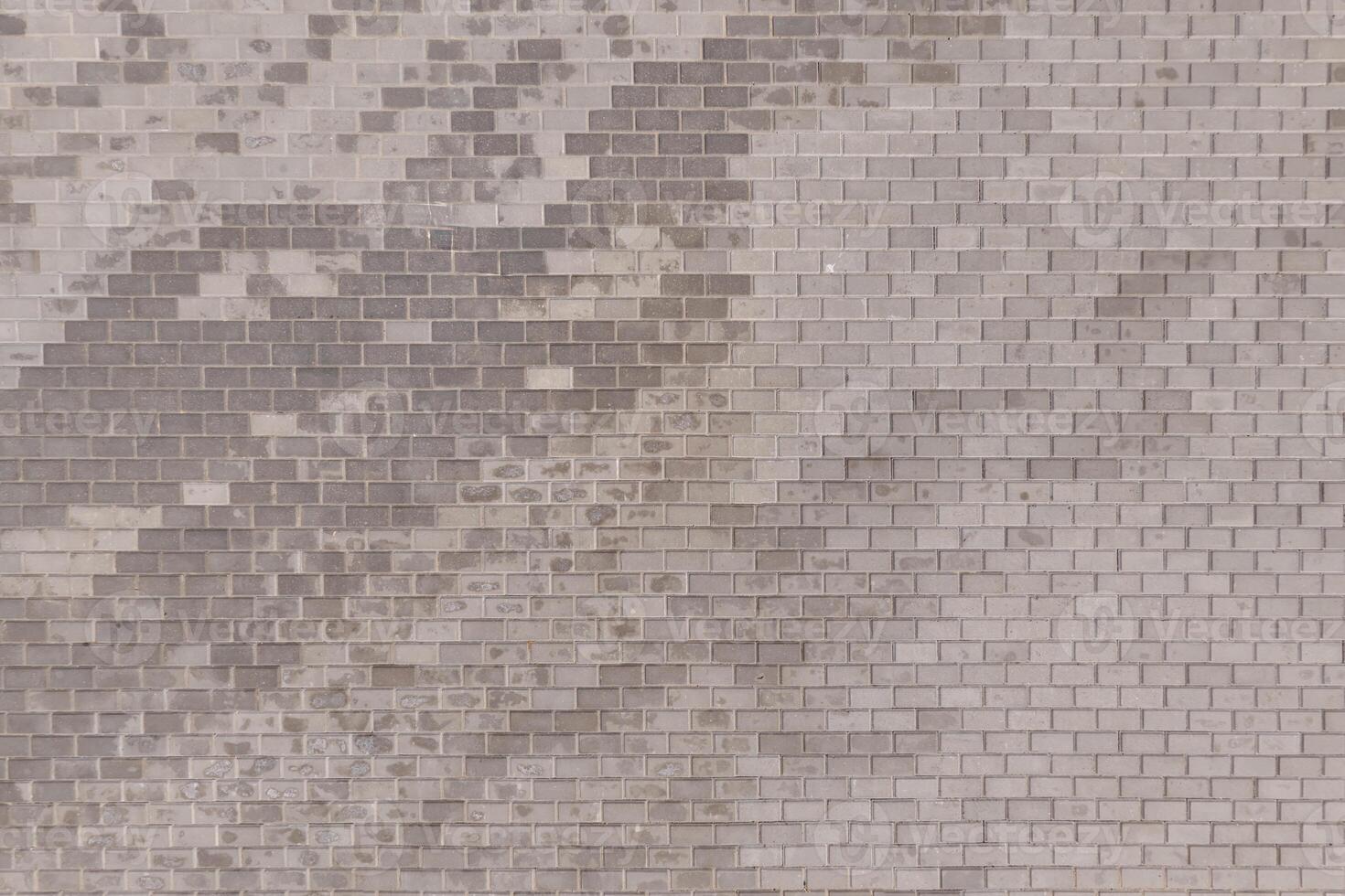 top view of the texture of paving slabs on pedestrian path photo