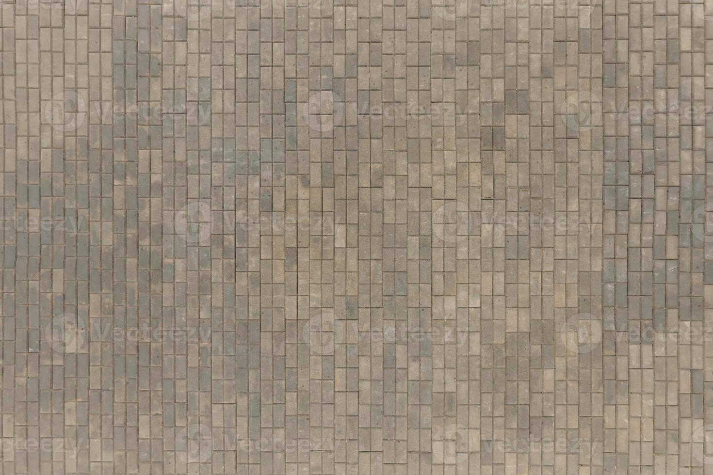 top view of the texture of paving slabs on pedestrian path photo