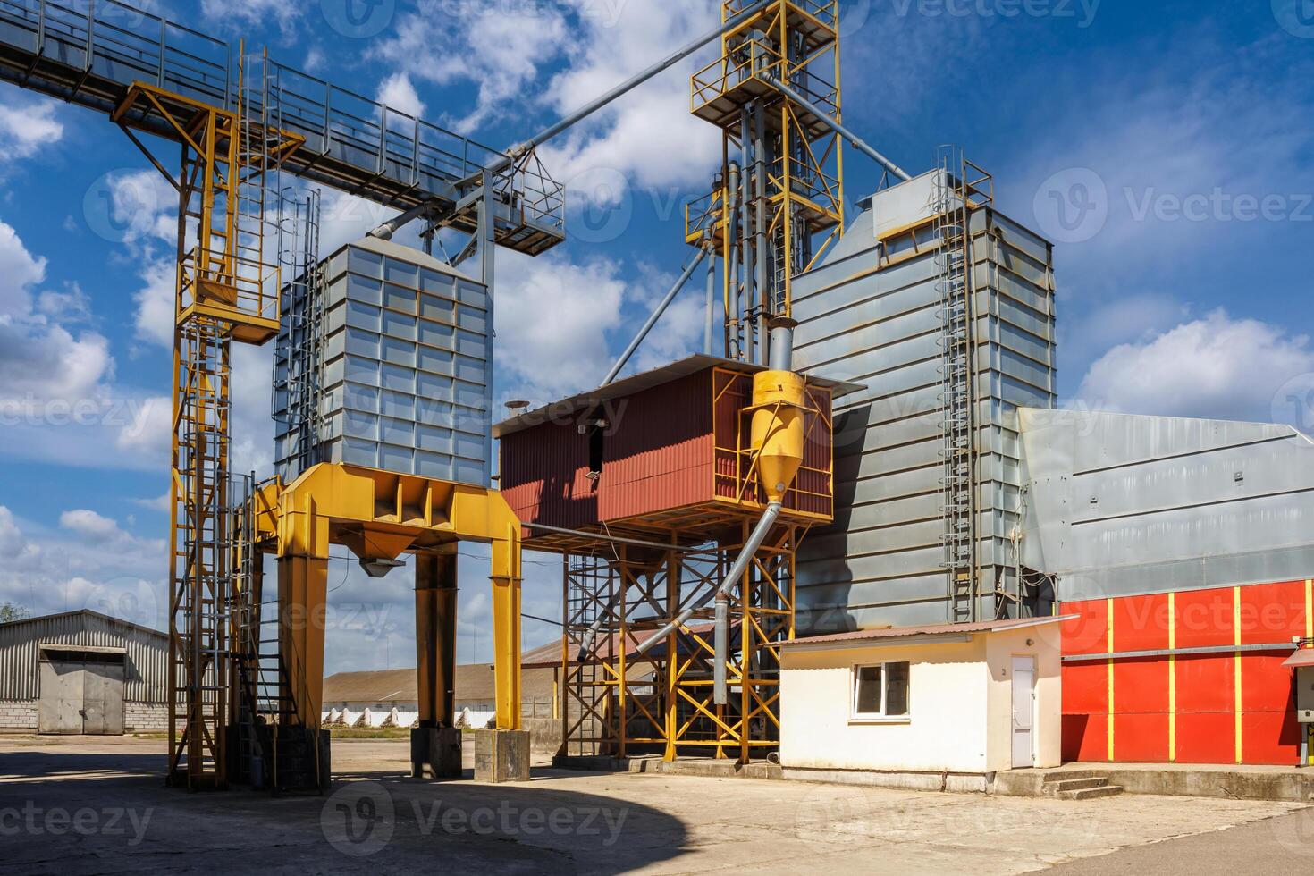 silos granary elevator on agro-industrial complex with seed cleaning and drying line for grain storage photo