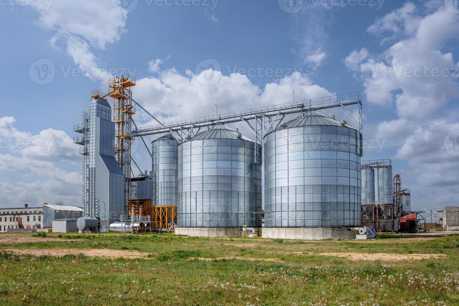 silos granary elevator on agro-industrial complex with seed cleaning and drying line for grain storage photo