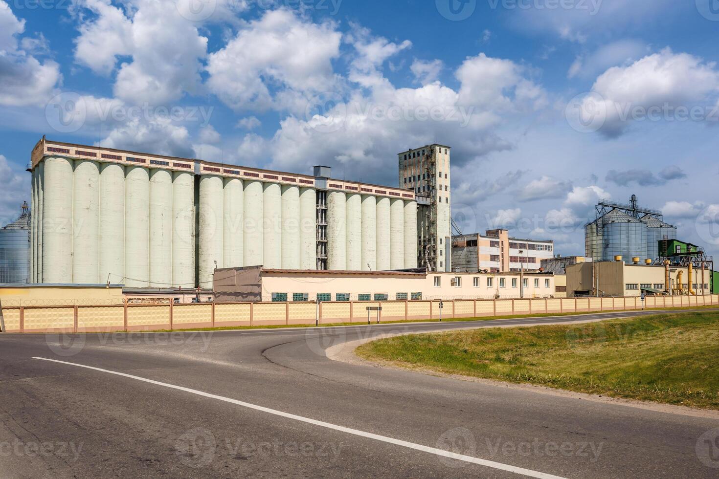 silos granary elevator on agro-industrial complex with seed cleaning and drying line for grain storage photo