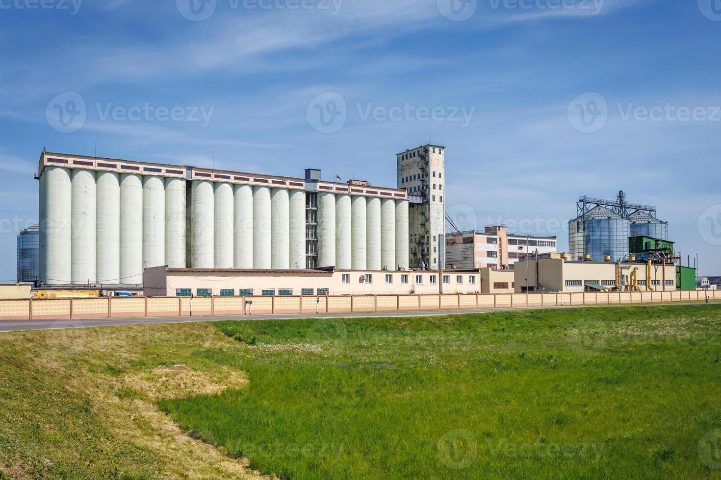 silos granary elevator on agro-industrial complex with seed cleaning and drying line for grain storage photo