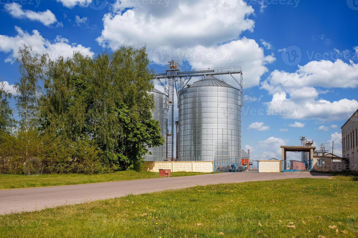 silos granary elevator on agro-industrial complex with seed cleaning and drying line for grain storage photo