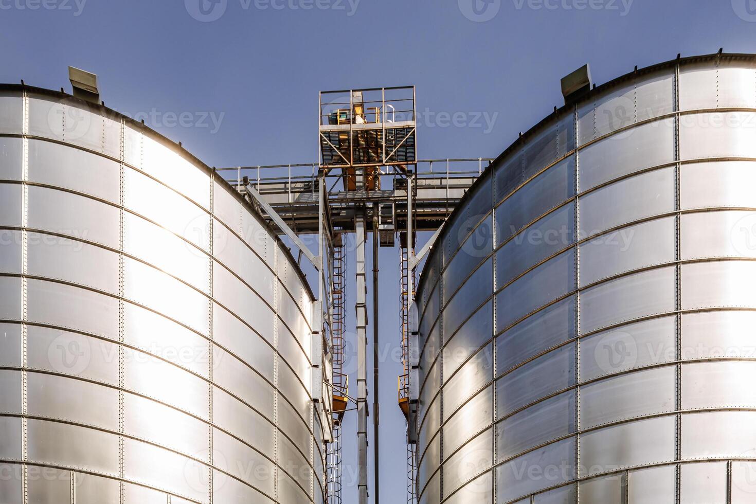 silos granary elevator on agro-industrial complex with seed cleaning and drying line for grain storage photo