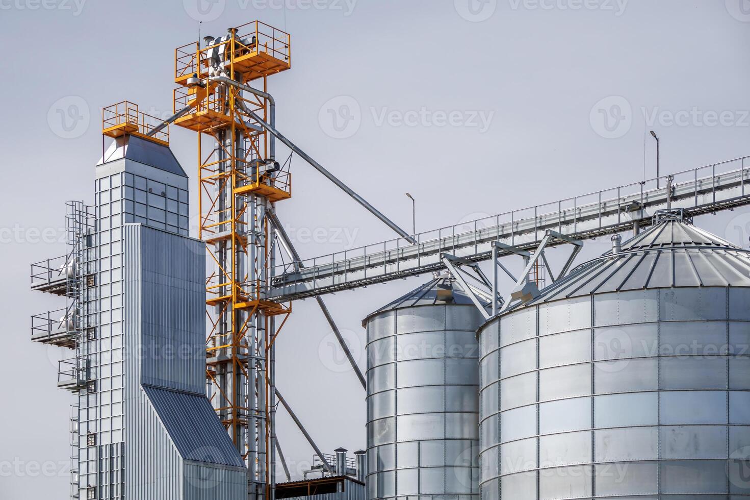 silos granary elevator on agro-industrial complex with seed cleaning and drying line for grain storage photo